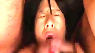 Tied down asian has fun with two slongs and sucks